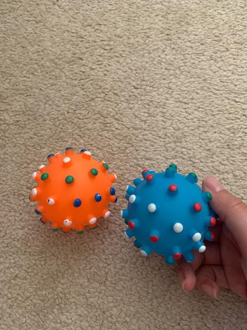 Durable Round Dog Ball Toy for Puppy Training with Squeaky Sound photo review