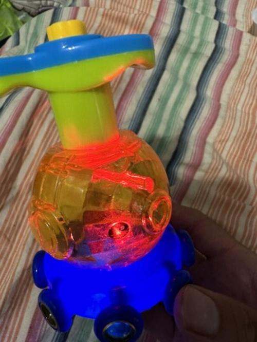 Luminous Rotating Gyro Fidget Spinner with Light and Music for Kids photo review